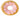 Squeaky plush dog toy in donut shape with pink icing and colorful sprinkles, perfect for playful pups.