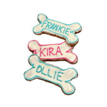 Personalized iced dog biscuit for pets, featuring names Frankie, Kira, and Ollie, decorated in blue and pink icing.