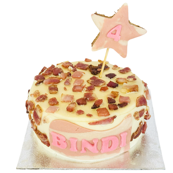 Delicious bacon dog cake decorated with bacon bits for Bindi's 4th birthday celebration.