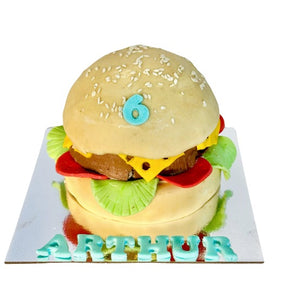 Delicious 4" burger dog birthday cake perfect for a paw-ty celebration for your furry friend!